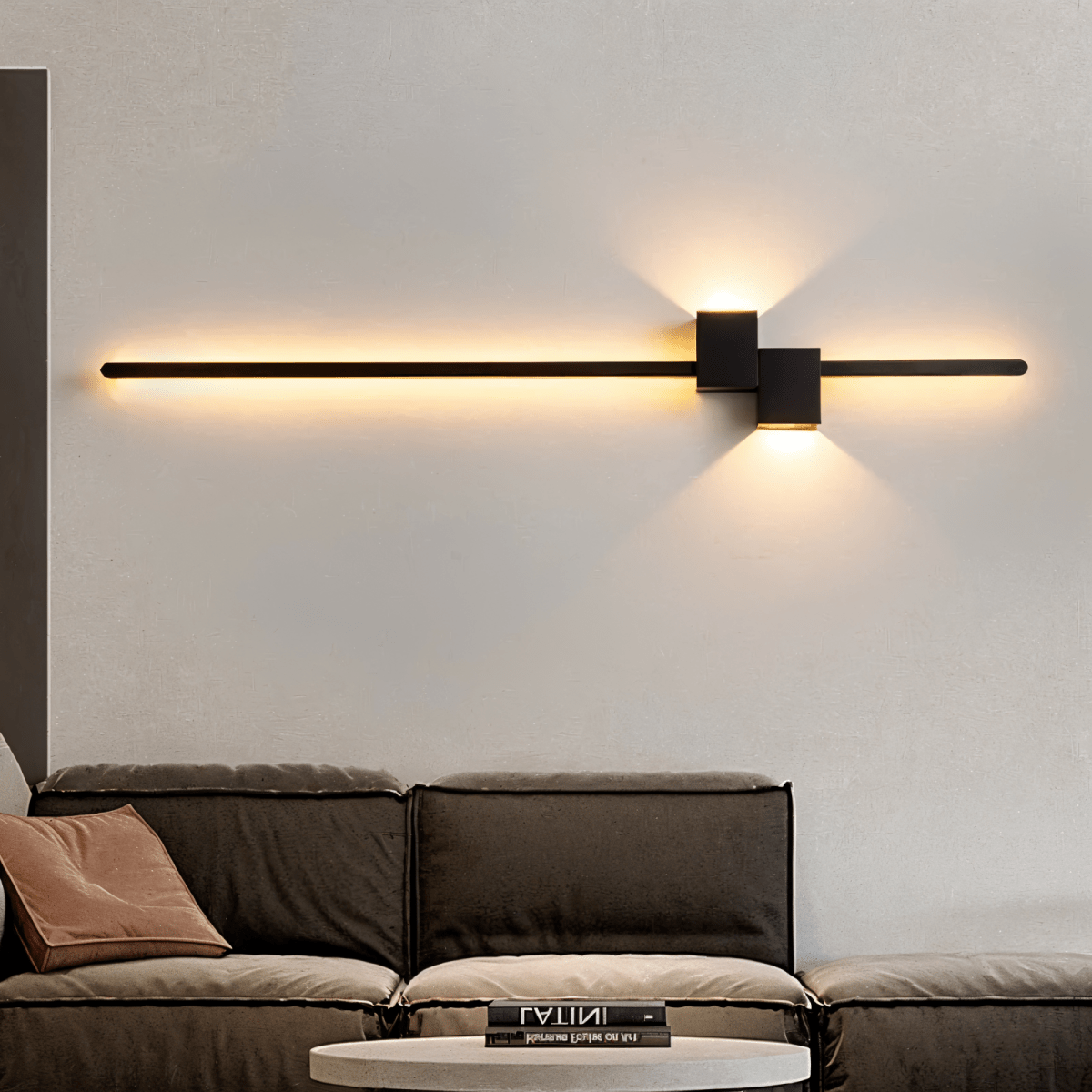 Close view of black linear sconce twin cube light heads