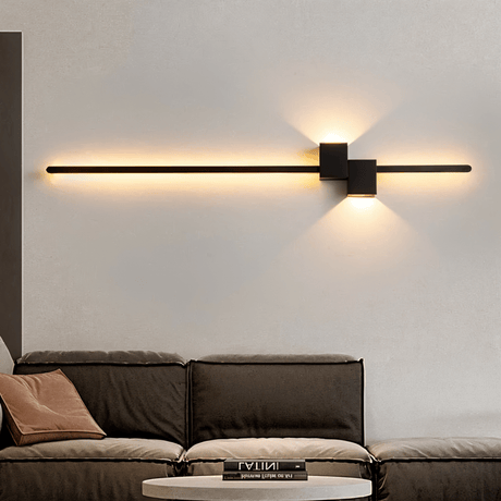 Close view of black linear sconce twin cube light heads