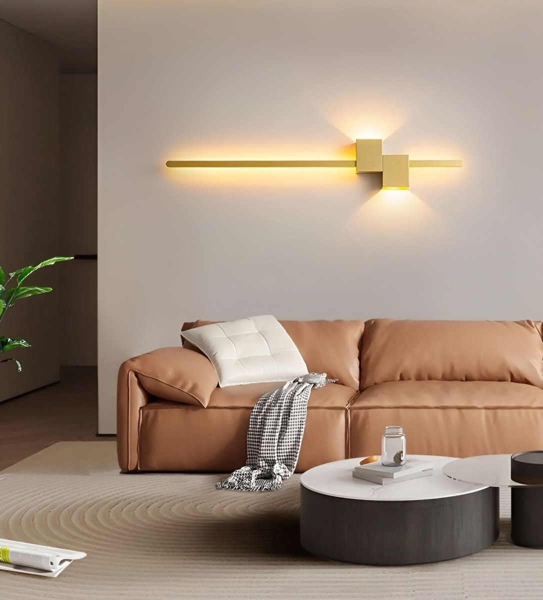 Linear wall sconce emitting soft upward and downward glow