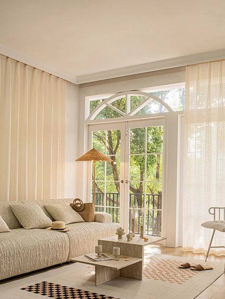 Lined curtain panels with soft beige sheer fabric