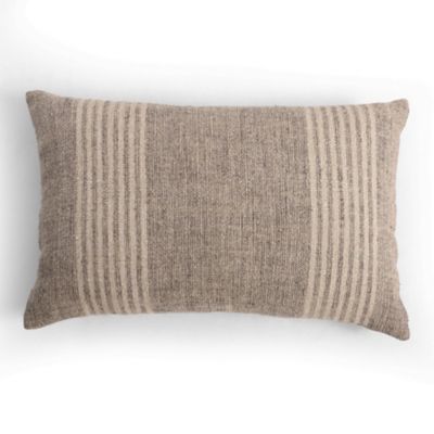 Flax decorative pillow complementing linen accent pillows arrangement