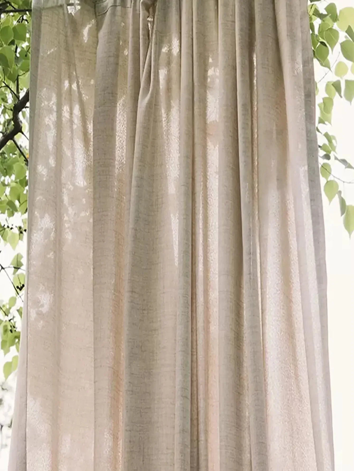 Linen light filtering curtains creating soft daylight privacy