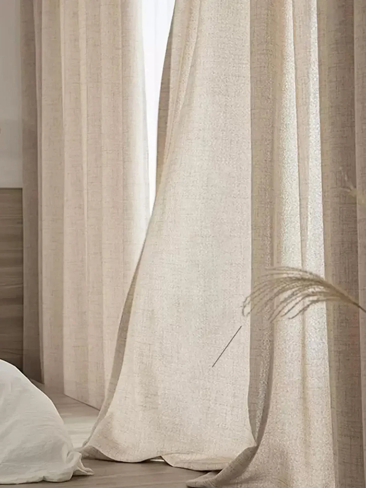 Linen light filtering curtains adding airy privacy to minimalist interior