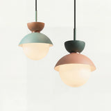 Macaron metal dome pendant light with a frosted glass globe on a white background