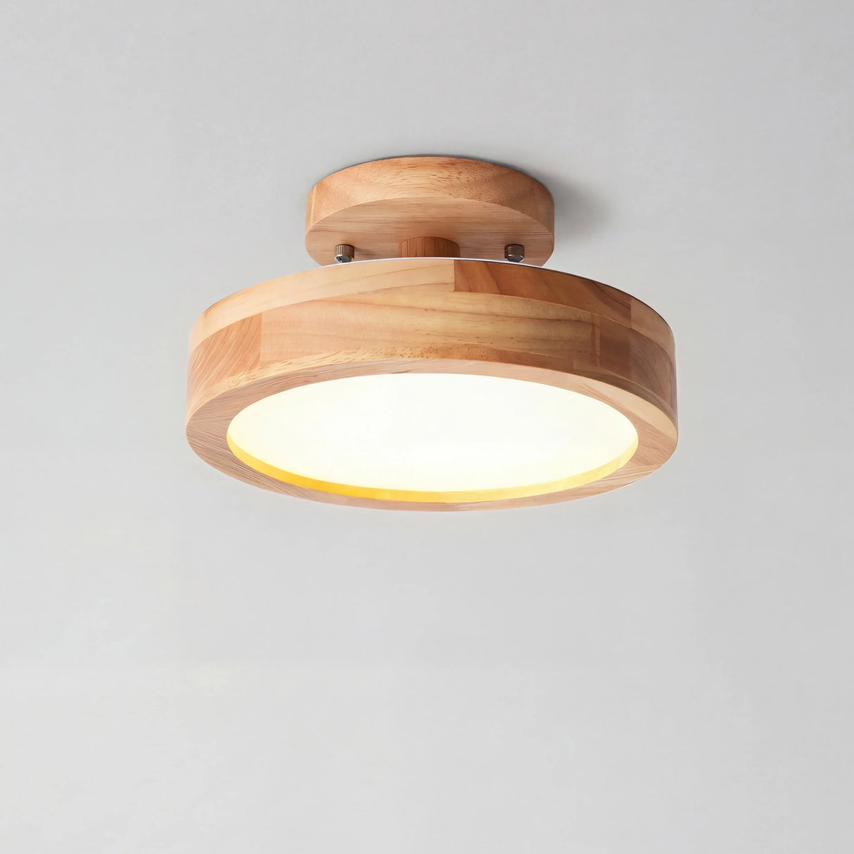 Round wood grain flush mount LED ceiling light shown as a studio product photo
