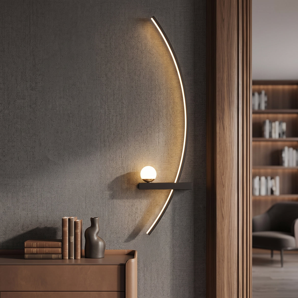 Black arc linear LED wall light with a frosted globe on a dark bedroom wall