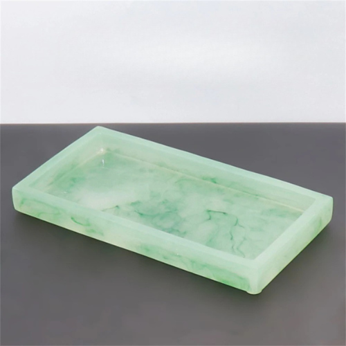 Marble storage tray styled with jewelry and perfume bottles