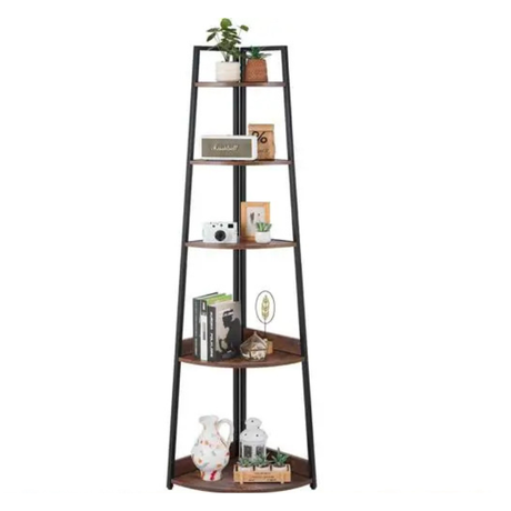 Metal corner bookshelf styled with plants and décor