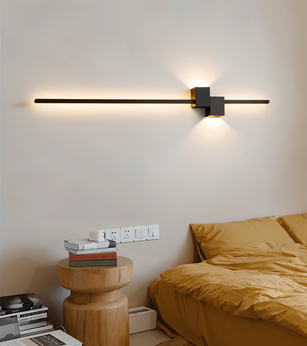 Metal linear wall light with slim tube profile and cube base
