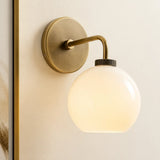 Milk glass globe wall sconce on metal arm colour option view 3