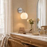 Milk glass globe wall sconce on metal arm alternative angle view 7