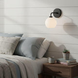 Milk glass globe wall sconce on metal arm further product image 10