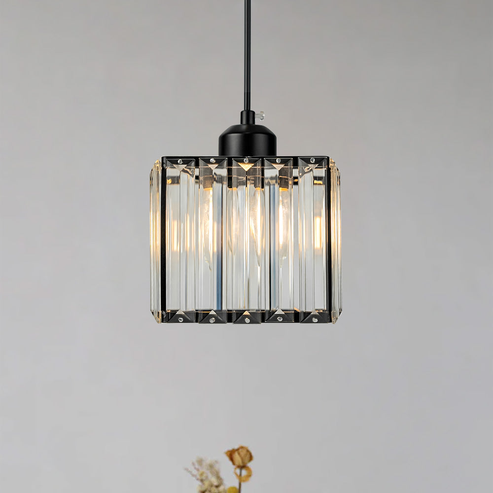 Mini crystal pendant light with a square faceted shade in a black frame