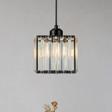 Mini crystal pendant light with a square faceted shade in a black frame