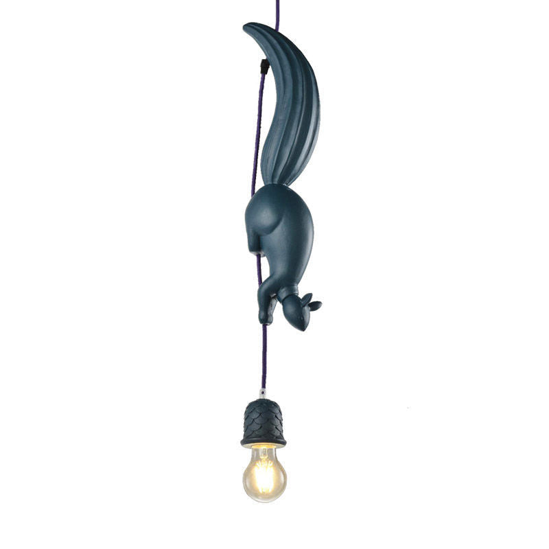 Blue squirrel pendant and pine cone shade on a plain background