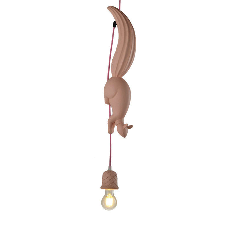 Pink squirrel pendant and pine cone shade on a plain background