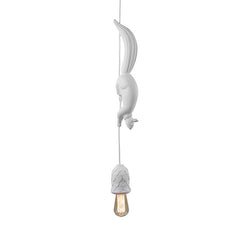 White squirrel pendant and pine cone shade on a plain background