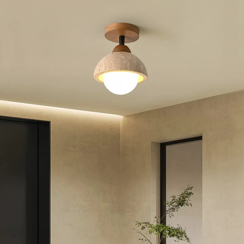 Minimalist travertine stone ceiling light close up