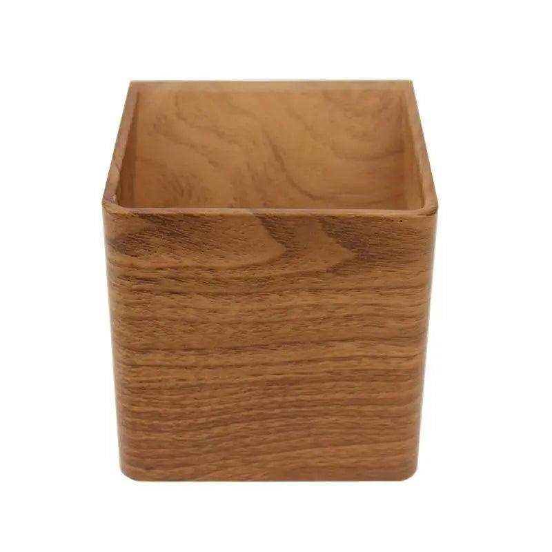 Wood cube wall sconce photographed alone from the front on white