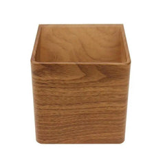 Wood cube wall sconce photographed alone from the front on white