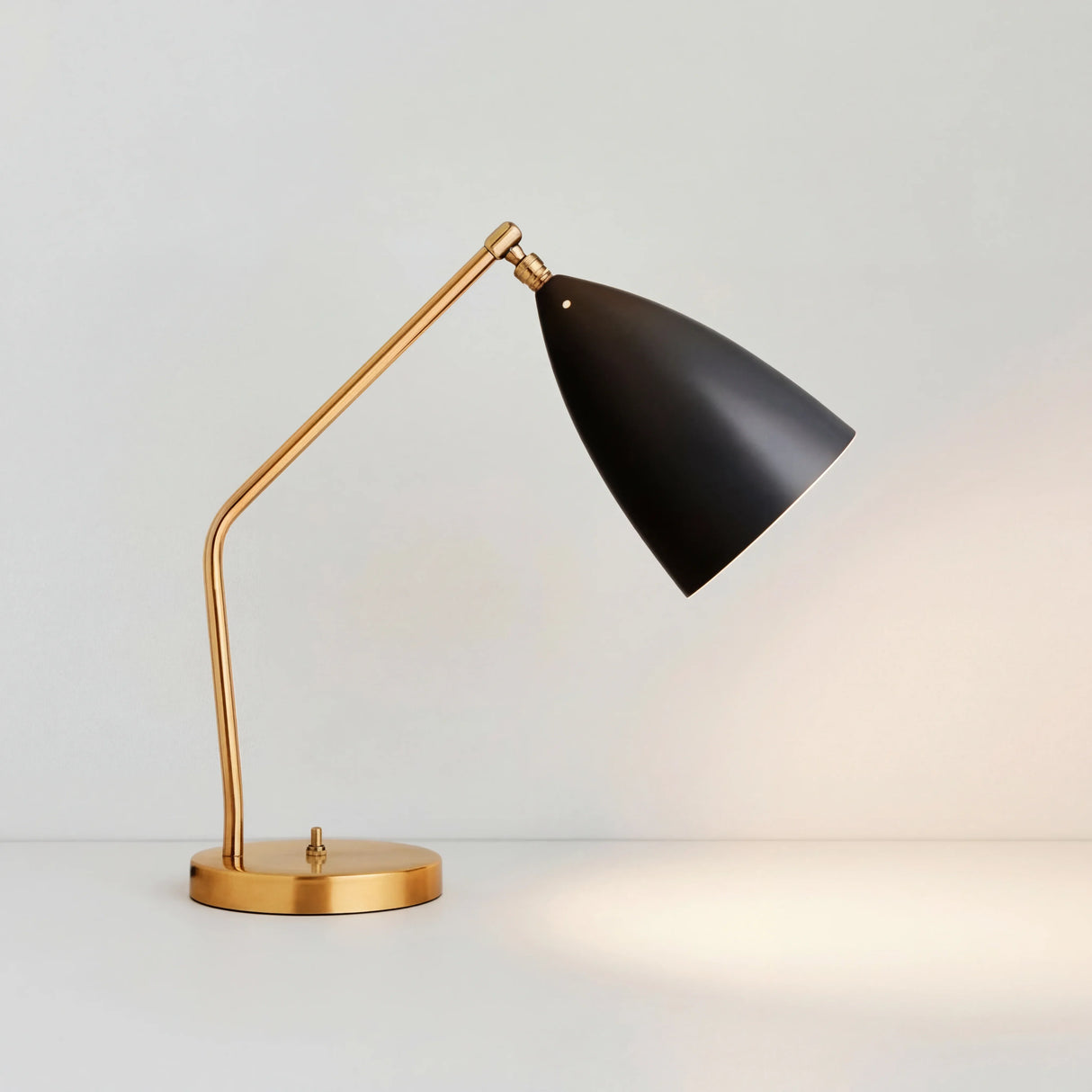 Modern brass table lamp with matte conical shade