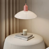 Angled view of modern disc pendant light and its central globe