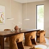 Rose gold disc pendant light with a warm metallic finish and flat shade