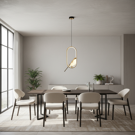 A modern dining room featuring a dark wood rectangular table with six upholstered chairs in a neutral beige and white palette, illuminated by a sleek oval pendant light hanging above.