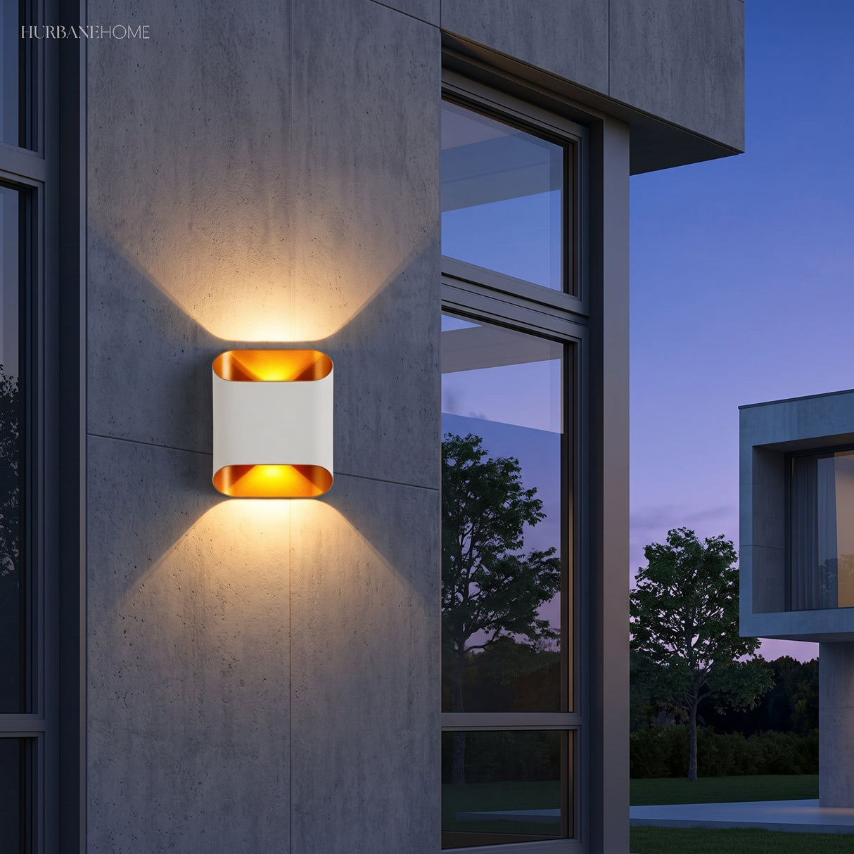 White up down wall sconce lit on a grey wall beside a window