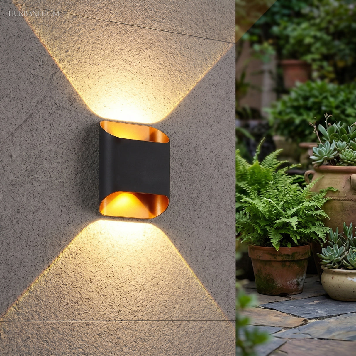 Black up down wall sconce lit on a textured render wall