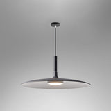 Black saucer pendant shade shown lit on a grey background