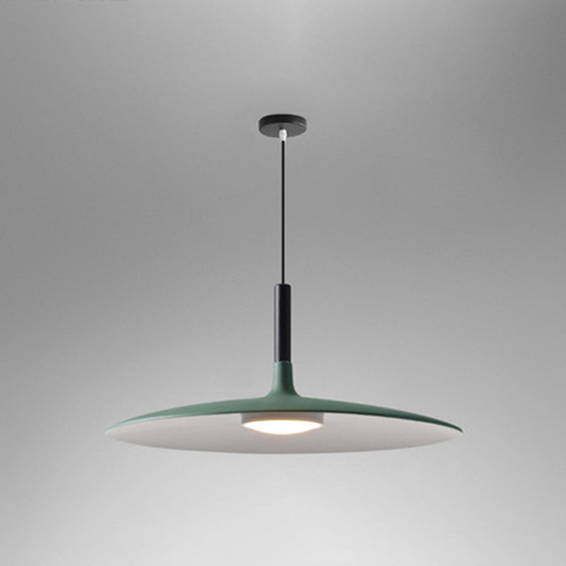 Green saucer pendant shade shown wide on a grey background