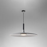 Grey saucer pendant shade shown at a low angle on grey