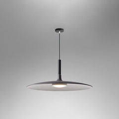 Grey saucer pendant shade shown lit on a grey background