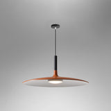 Orange saucer pendant shade shown lit on a grey background