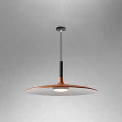 Orange saucer pendant shade shown lit on a grey background