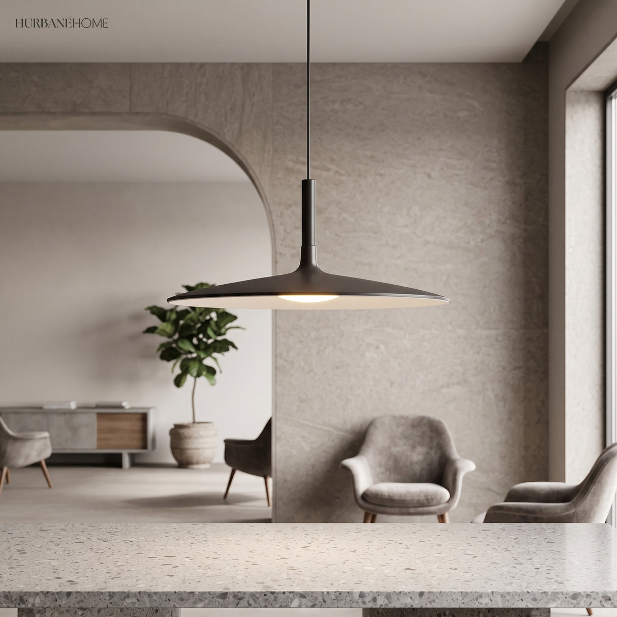 White saucer pendant lit in a pale living room with an archway