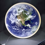 Illuminated Earth globe wall sconce detail view 4 showing finish and construction