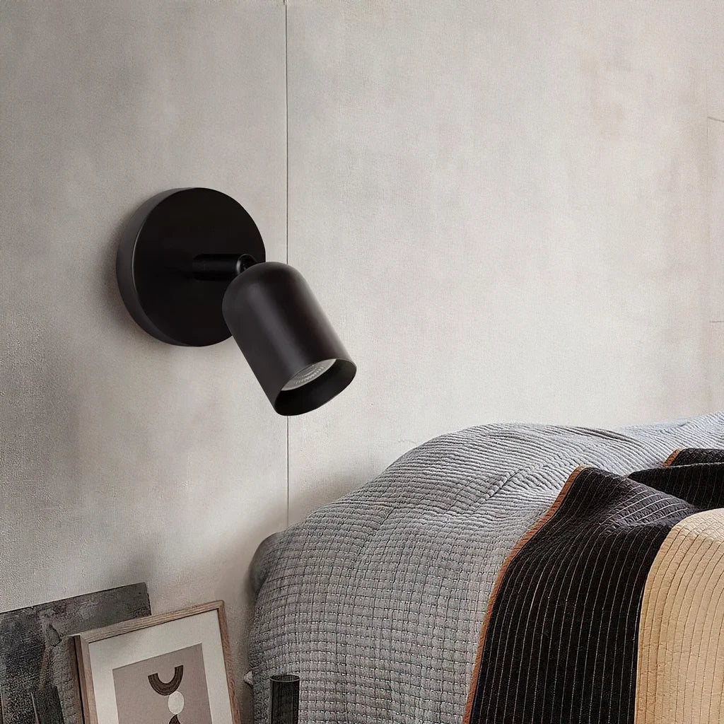 Front-lit product view of the modern reading wall sconce on plain background