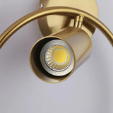 Close view of the brass cylinder head and its recessed light module