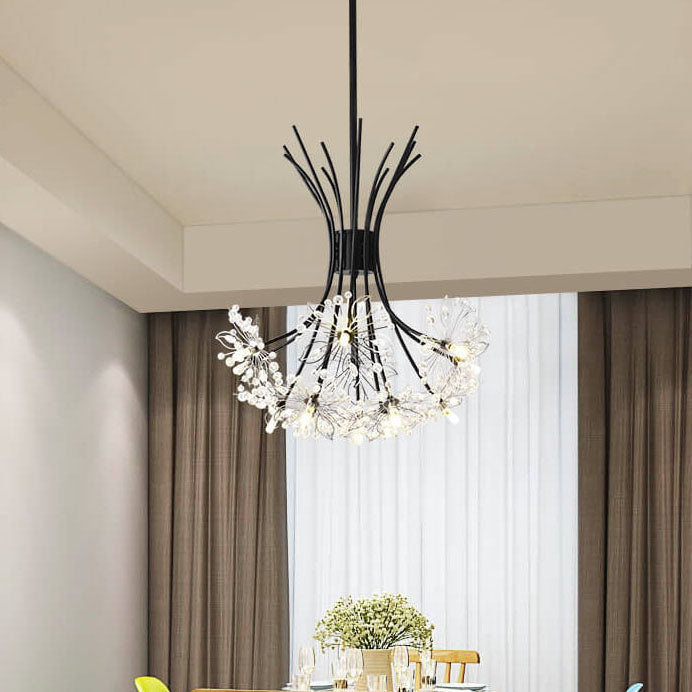 Black dandelion chandelier in a dining room with soft beige curtains