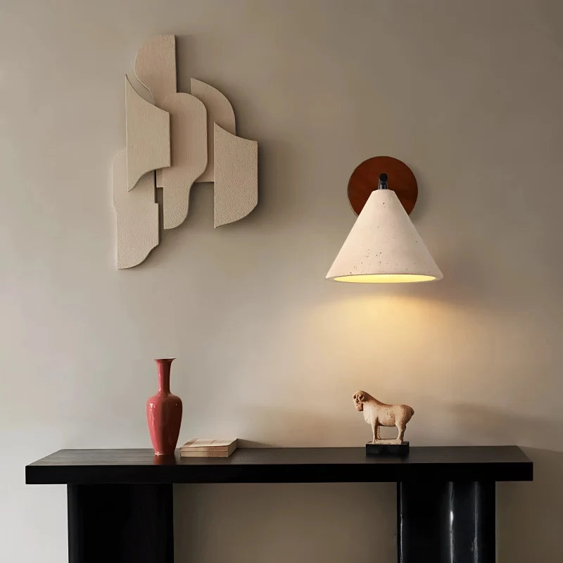 Modern stone wall light casting a soft ambient glow