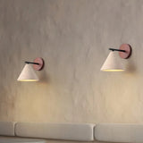 Modern travertine wall sconce with walnut wood backplate