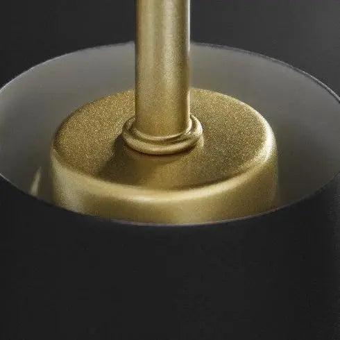 Close view of the brass rod entering the top of the cone shade