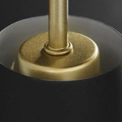 Close view of the brass rod entering the top of the cone shade