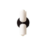 Two white cylinders on a black backplate without a cord