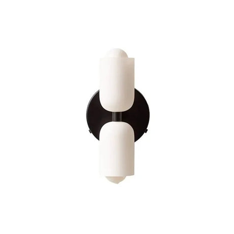 Two white cylinders on a black backplate without a cord