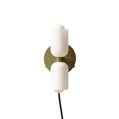 White cylinders on an olive gold backplate with a trailing cord