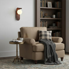 Modern wall sconce side profile showing slim wood backplate
