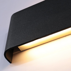 Close view of the folded metal edge with the LED glowing inside